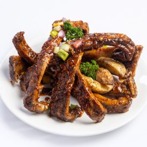 Full Rack of Pork served with Potato Wedges (6 Pieces)