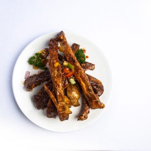 Pork Ribs served with Potato Wedges (6 Pieces)